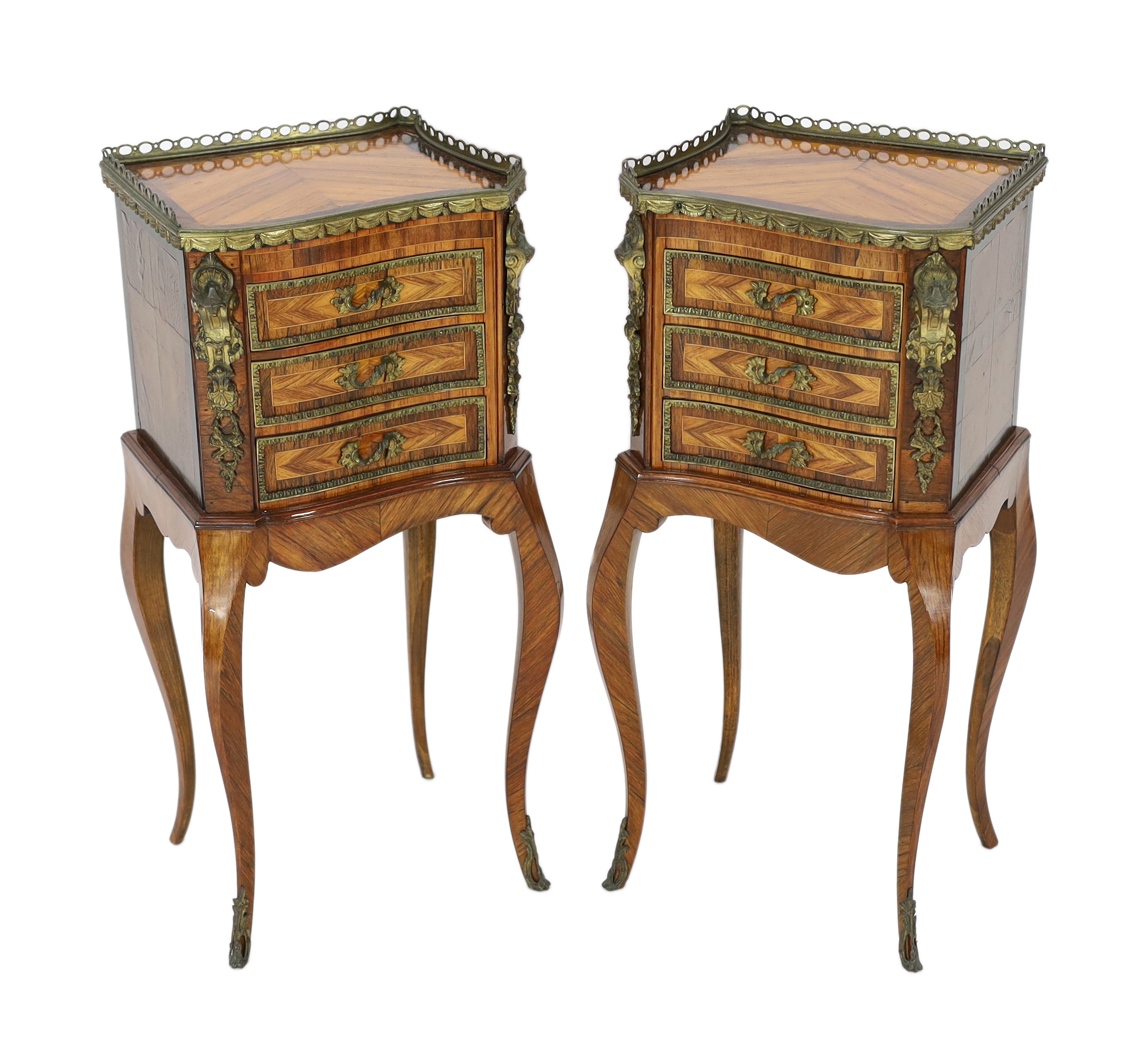 A pair of Louis XVI style ormolu mounted kingwood bedside chests, 34cm wide, 27cm deep, 74cm high